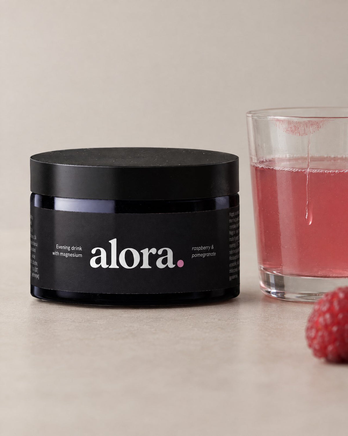 ALORA jar and a half-drunk glass (illustrative)